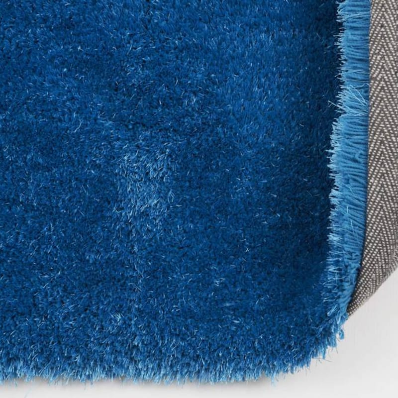 Ross 33 - Rond hoogpolig vloerkleed in blauwe kleursamenstelling