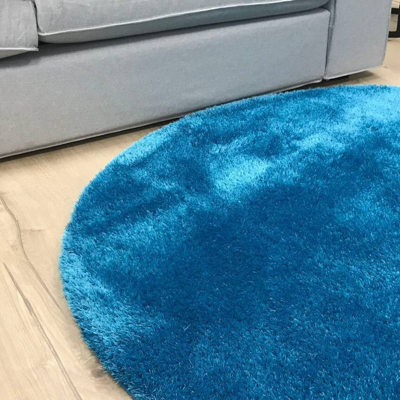 Ross 33 - Rond hoogpolig vloerkleed in blauwe kleursamenstelling