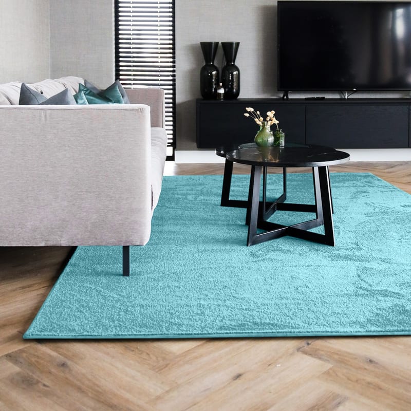 Frisco 32 - Zacht effen vloerkleed in turquoise